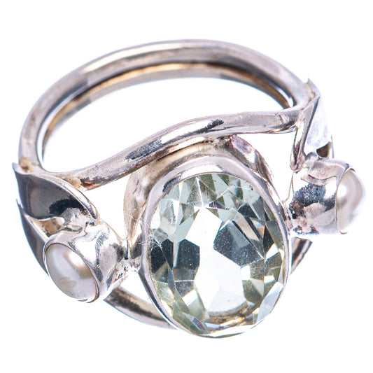 Sterling silver ring with oval faceted light-green gemstone and side prongs