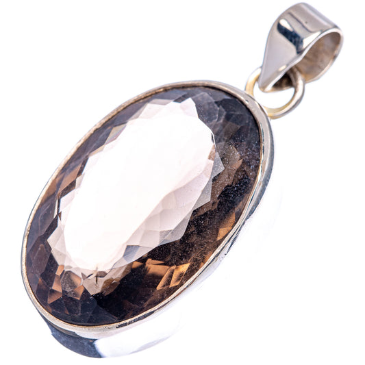 Smoky quartz pendant with oval faceted dark stone and silver top bail; .925 setting