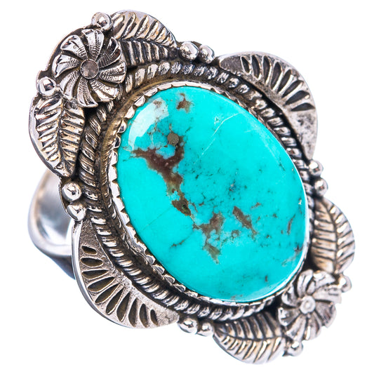 Turquoise oval cabochon ring with detailed silver leaf pattern and beaded edges