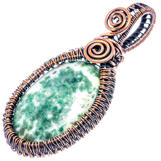Moss agate wire-wrapped pendant with oxidized copper spiral frame and green stone