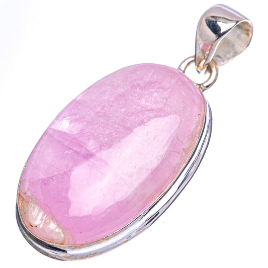 Oval pink-purple gemstone pendant in .925 sterling silver bezel, side view