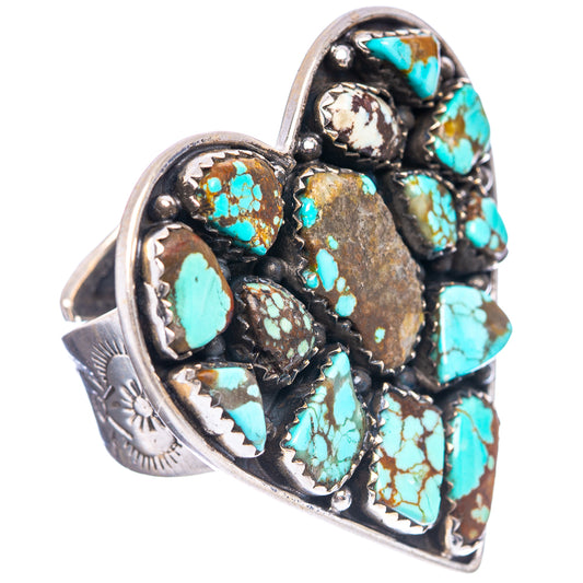 Heart-shaped turquoise cabochon ring on sterling silver with detailed bezel setting