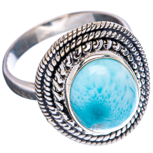 Sterling silver larimar ring with oval light-blue cabochon and textured band
