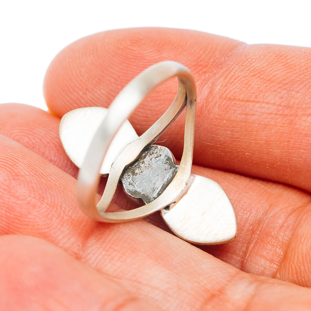 Sterling silver openwork ring band with oval stone settings, side view