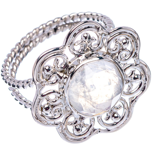 Sterling silver moonstone ring, round opalescent stone in scrollwork bezel with braided band