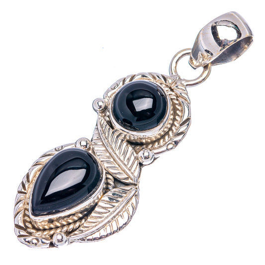 Sterling silver onyx pendant with two oval black stones and oval bail loop