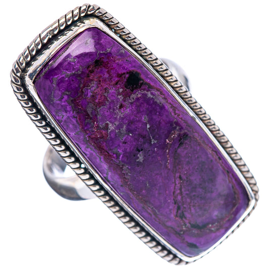 Sterling silver sugilite ring showing rectangular purple cabochon with beaded border