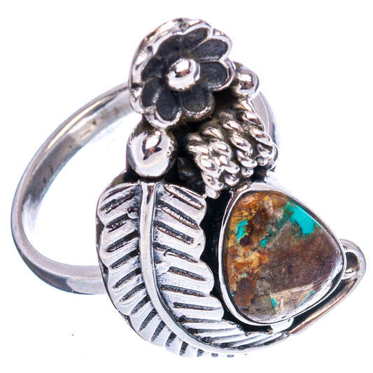 Sterling silver ring with turquoise teardrop stone and raised flower crest