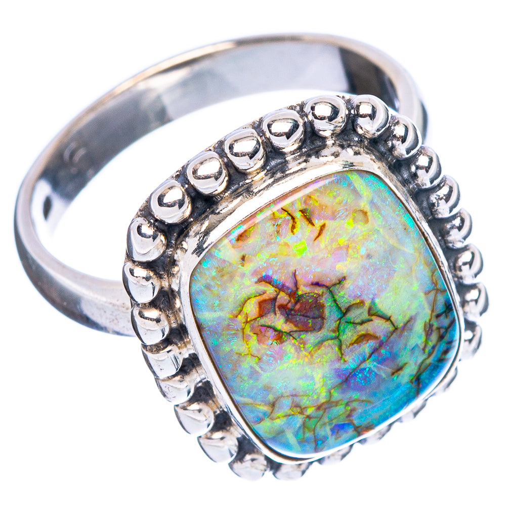 Sterling silver opal ring with oval stone and raised beaded gallery on slim band