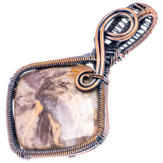 Oxidized copper wire-wrapped oval fossil stone pendant with circular bail