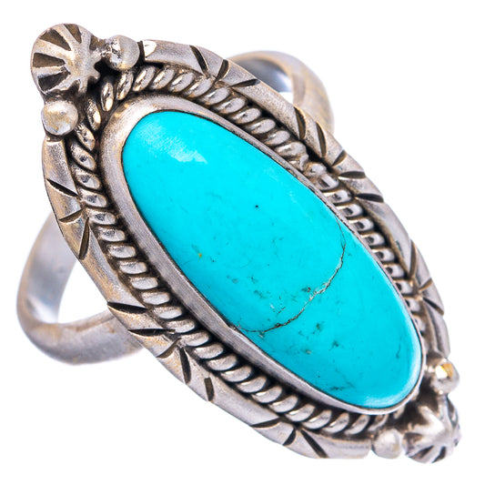 Adjustable oval turquoise cabochon ring in .925 sterling silver with rope border