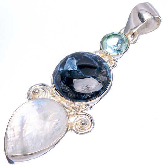 Sterling silver pendant with dark oval stone, moonstone and blue topaz accent, bail