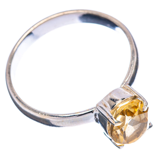 Sterling silver citrine oval ring with faceted yellow gemstone, full band view