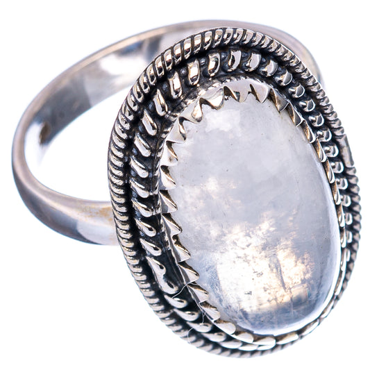 Sterling silver ring with oval cabochon and ornate rope edge, side view
