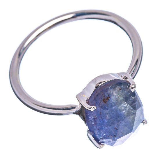 Sterling silver tanzanite ring with raised oval faceted blue gemstone and prongs
