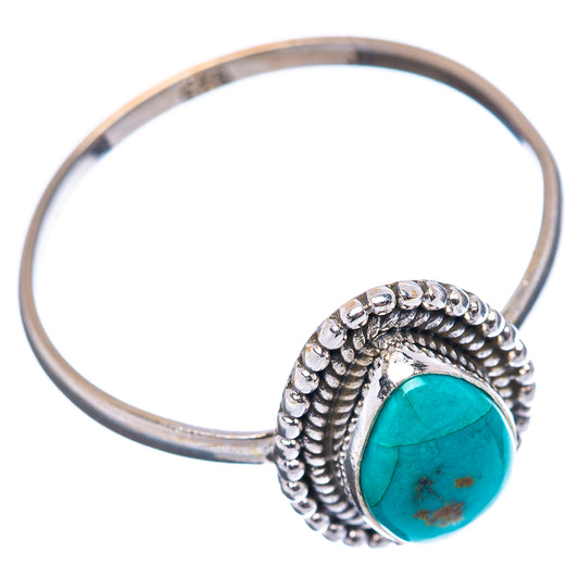 Sterling silver turquoise ring with teardrop cabochon and beaded halo border