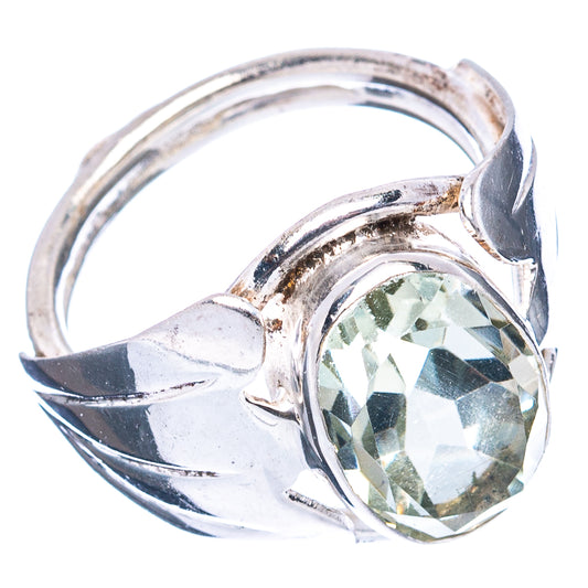 Sterling silver ring, faceted oval gemstone set in prongs, size 4