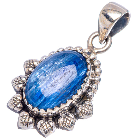 Sterling silver kyanite pendant with oval blue cabochon, leaf accents, and bead detailing