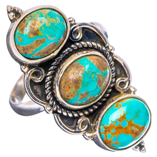 Adjustable sterling silver turquoise ring with three oval cabochons and detailed scrollwork