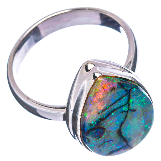 Sterling silver opal ring with oval blue-green cabochon and pink flashes