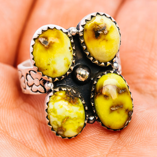 Sterling silver ring with five dark yellow oval cabochons and engraved floral accents