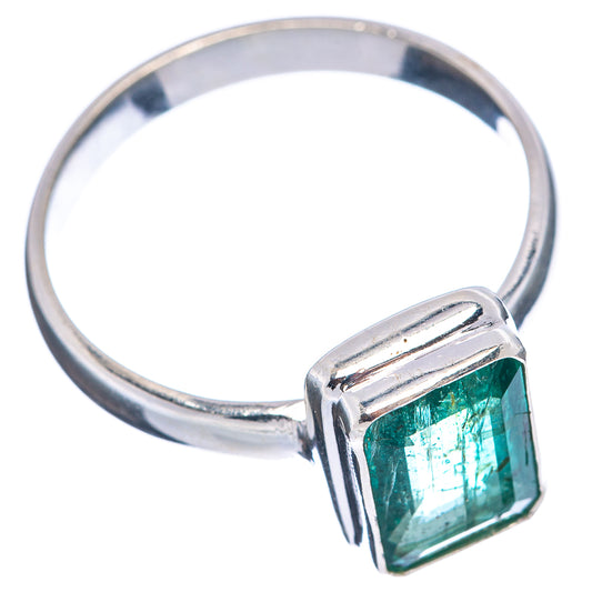 Sterling silver ring with rectangular faceted green gemstone and prong band