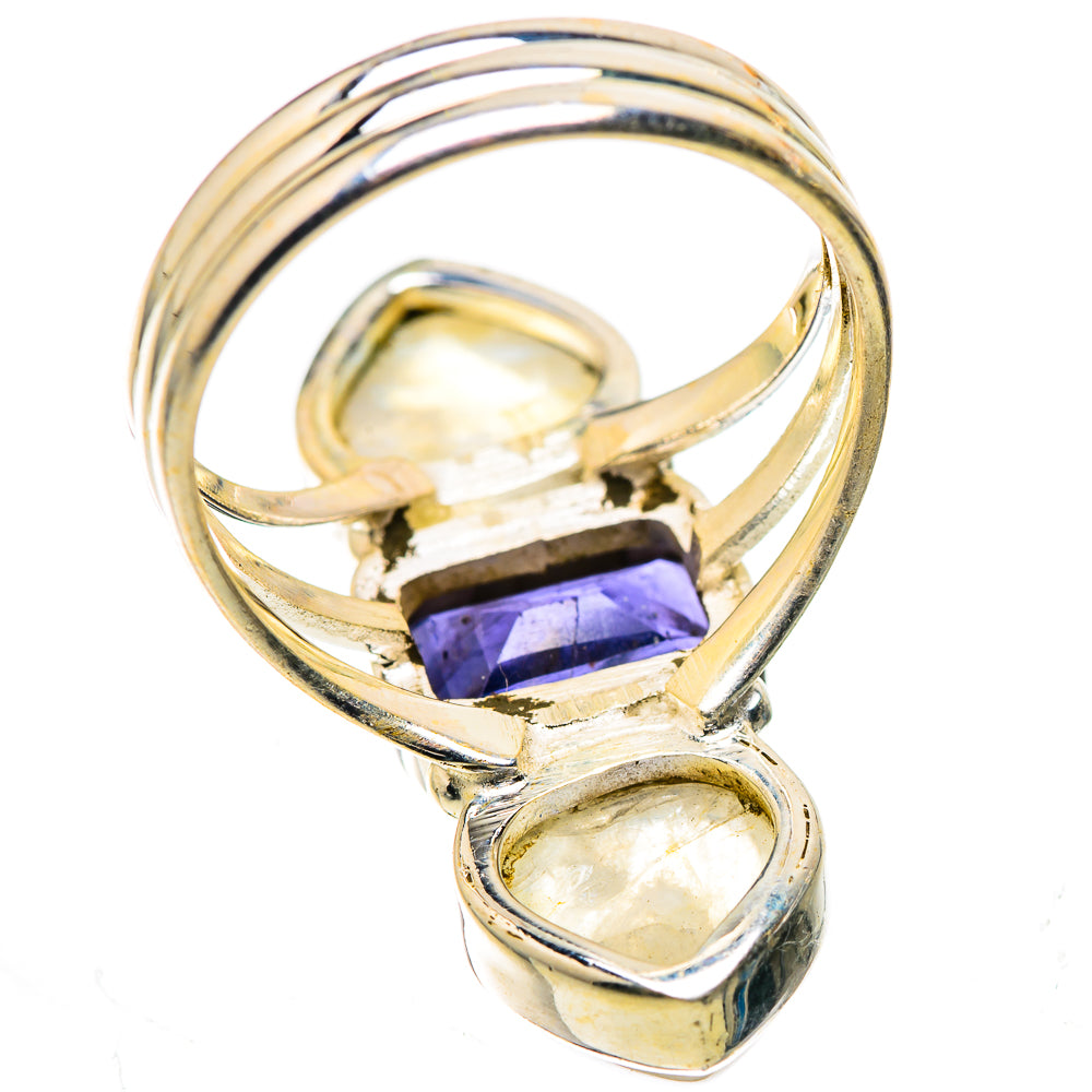 Silver gemstone ring with dark blue square center stone and two oval moonstone side stones