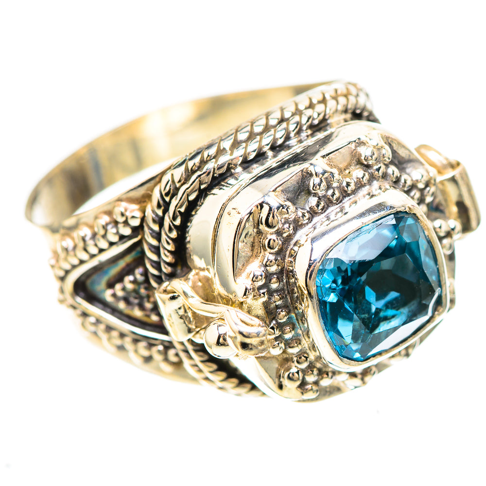 Sterling silver ring with blue gemstone, rope-textured band and detailed side engravings