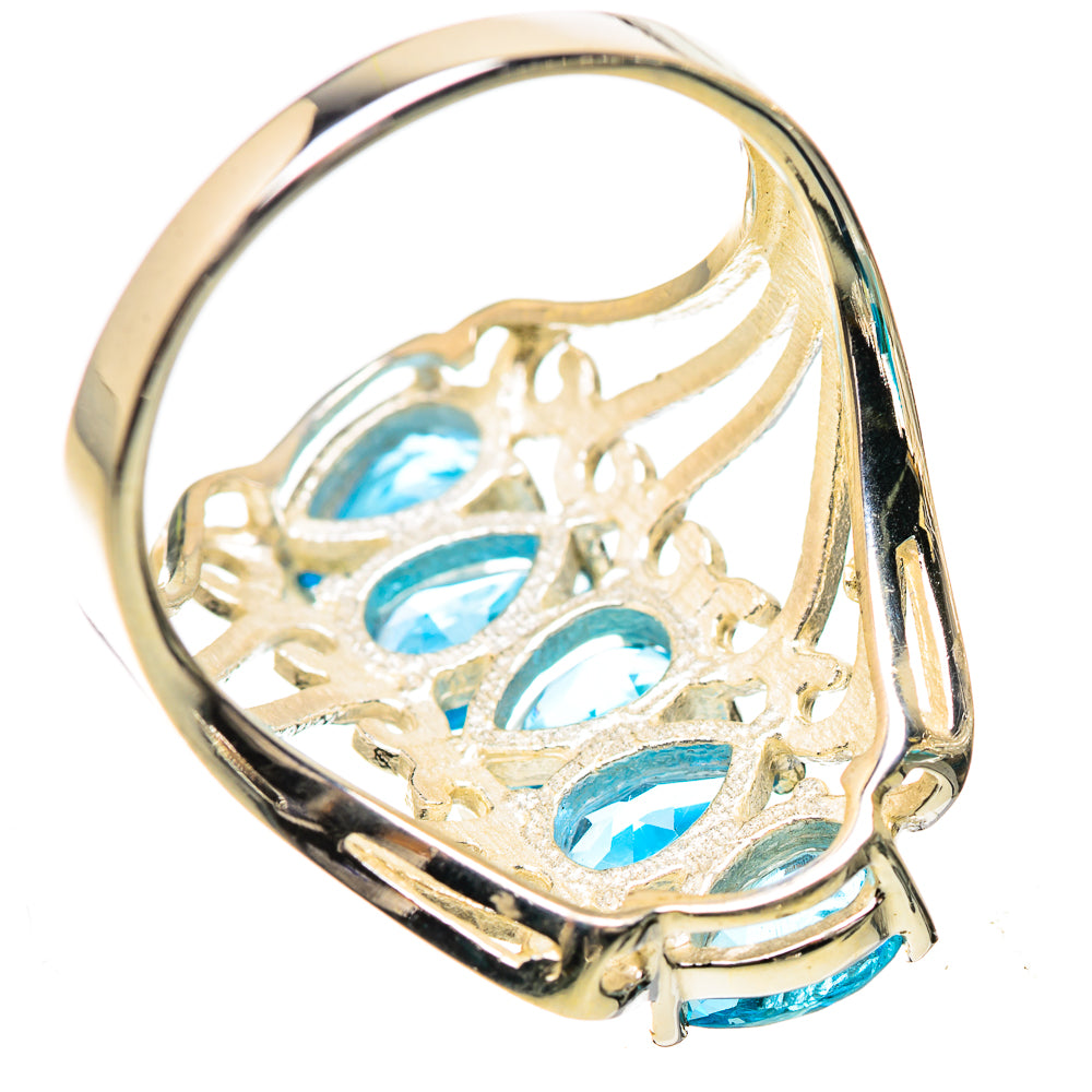 925 sterling silver ring with blue topaz stones on inside lattice prongs