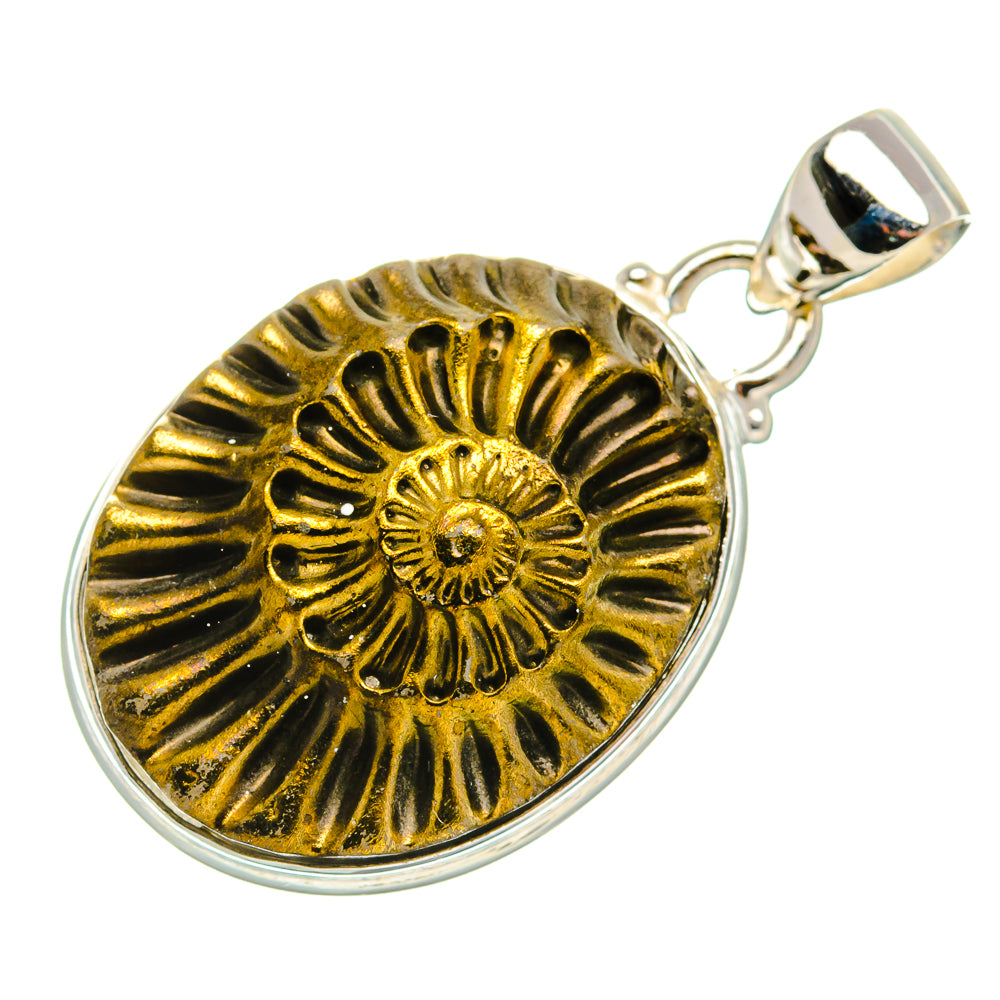 Round pyrite fossil pendant with gold spiral pattern, polished silver frame and bail