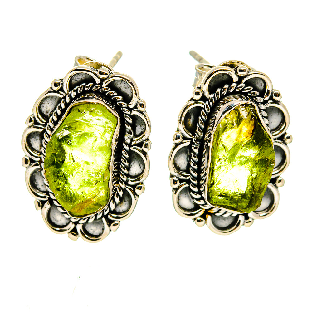 Oval rough green peridot stud earrings in ornate 925 sterling silver settings