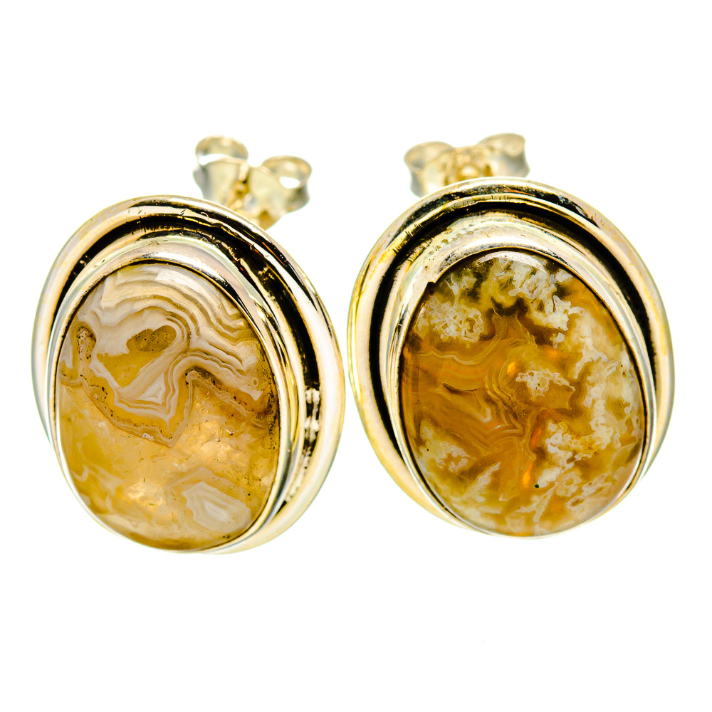 Pair of oval lace agate stud earrings, gold and cream cabochons in silver bezels