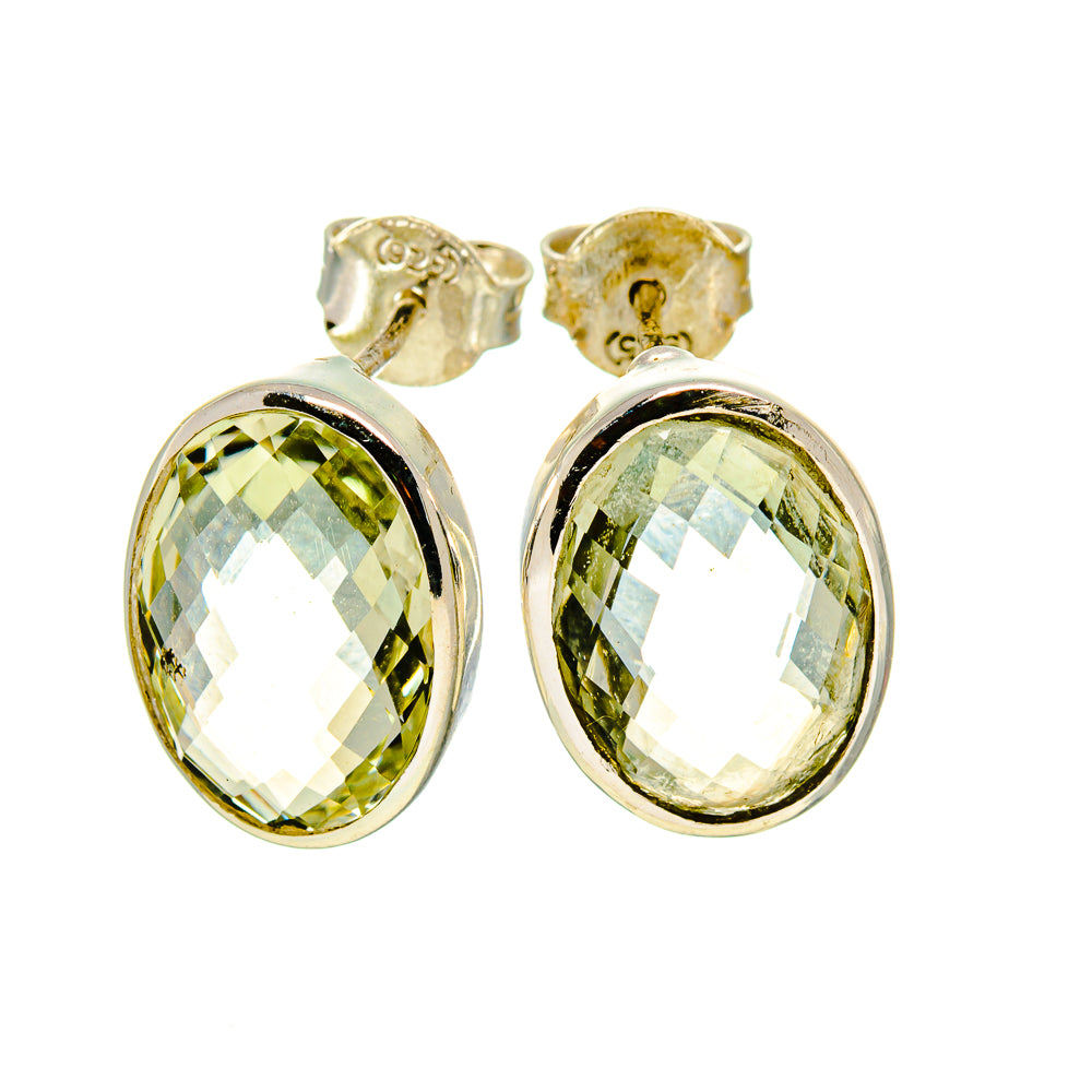 Oval faceted green amethyst stud earrings in gold-tone silver setting