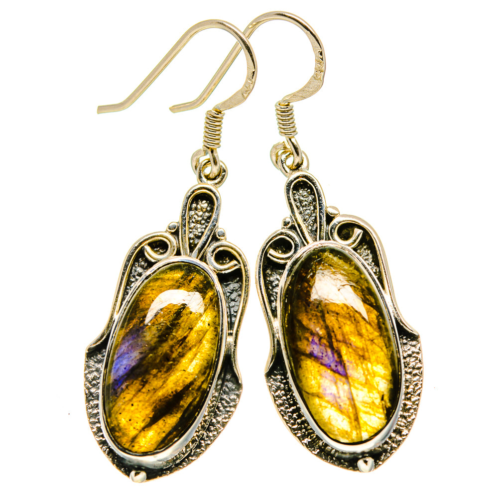 Oval labradorite drop earrings with gold-tone ornate frames and shepherd hooks