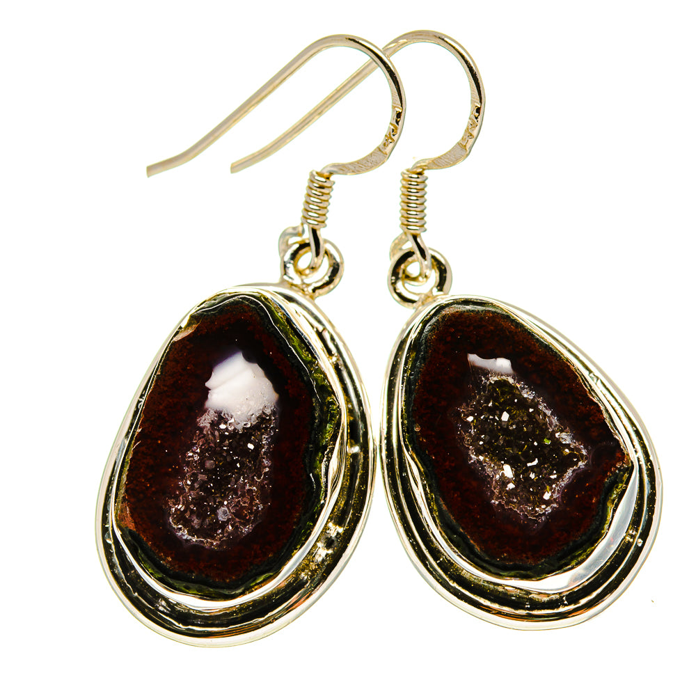 Teardrop red-brown geode slice earrings with fishhook backs, silver-tone