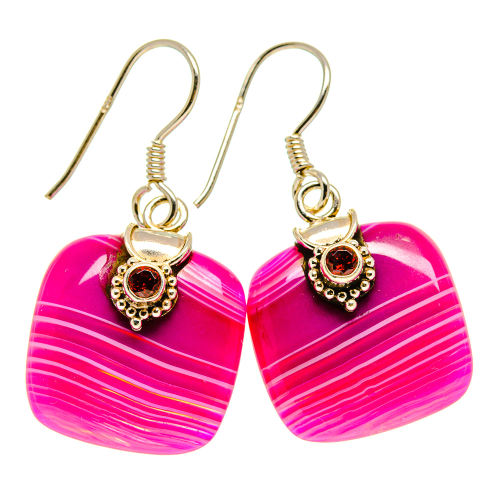 Pink striped teardrop earrings with red gemstone centers and gold-tone hooks