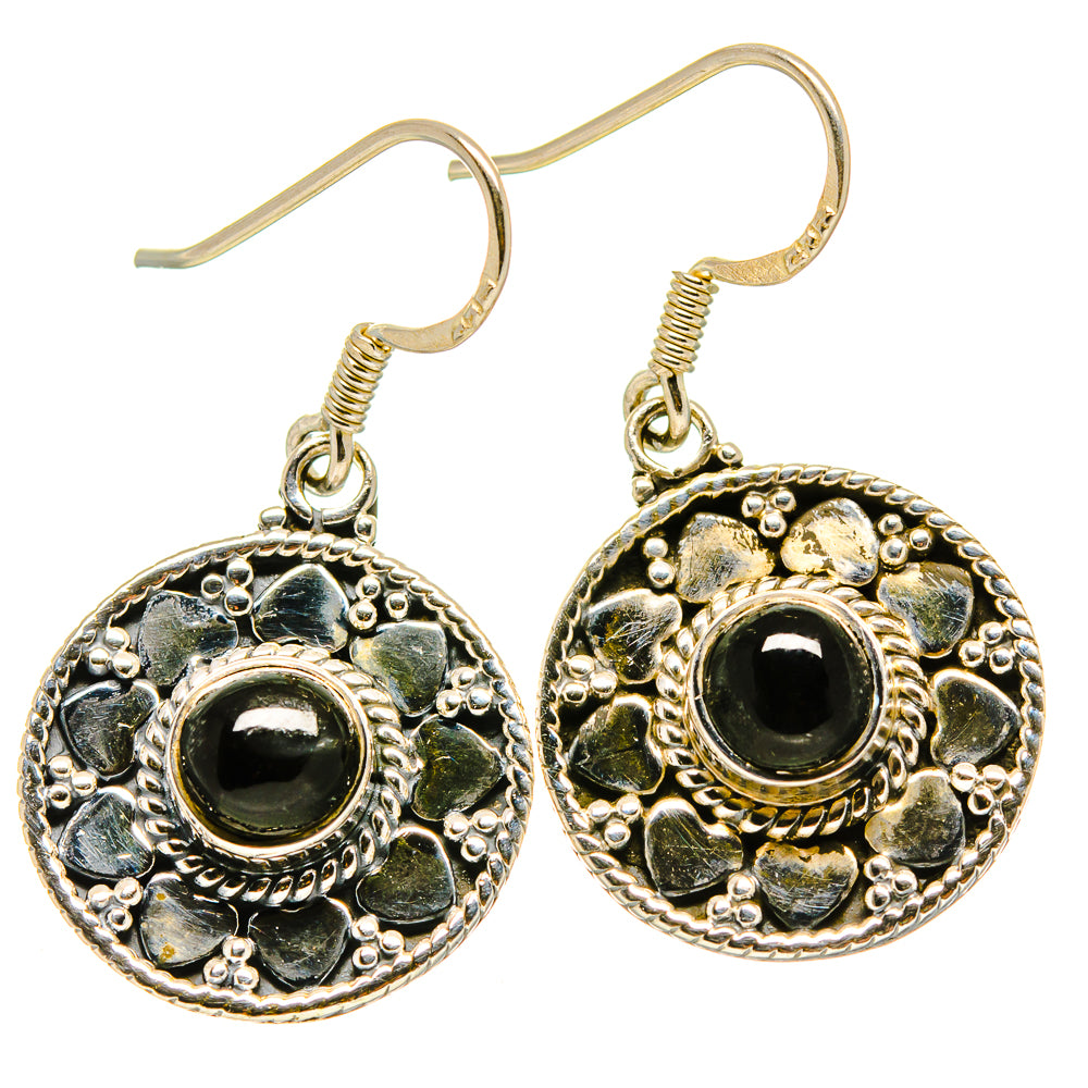 Round black onyx drop earrings with ornate silver-tone settings and fishhook backs