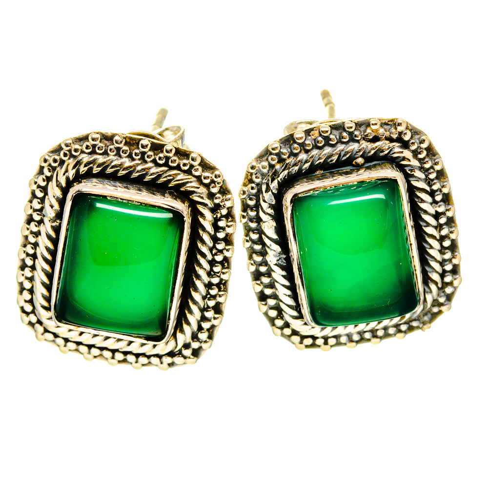 Green onyx stud earrings with ornate gold-tone halo and square bezel