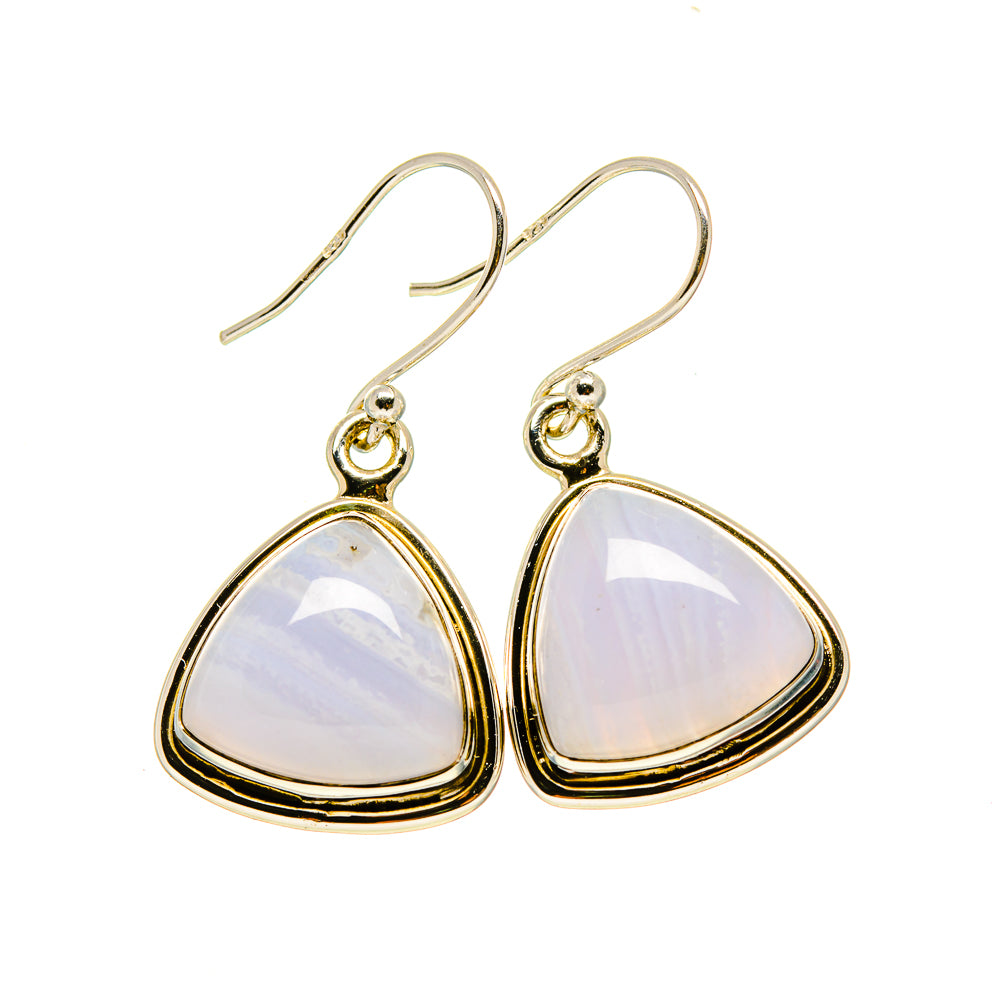 Silver-tone triangular earrings with opalescent pale blue/white stone drops