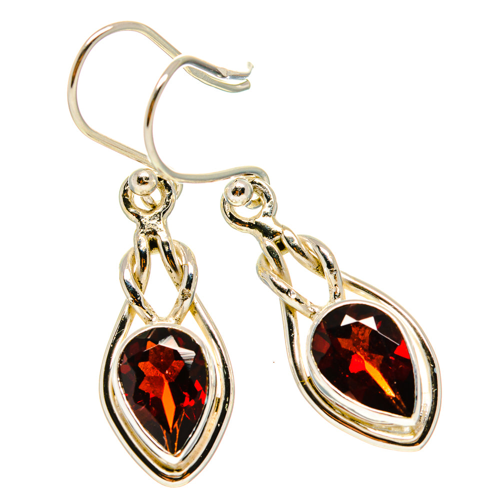 Garnet drop earrings in 925 sterling silver with teardrop-framed oval dark red stones