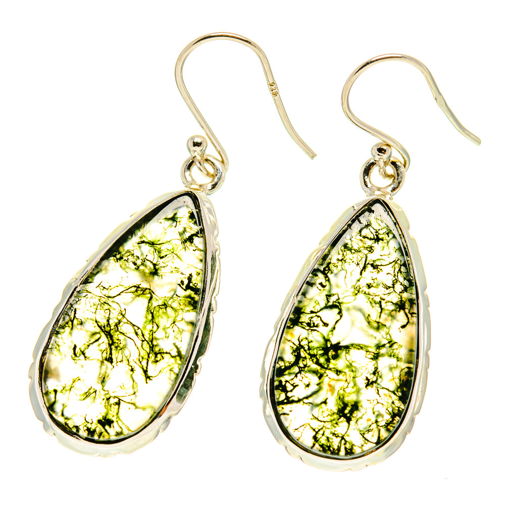 Silver-tone teardrop earrings with moss agate drops, bright green resin patterns.