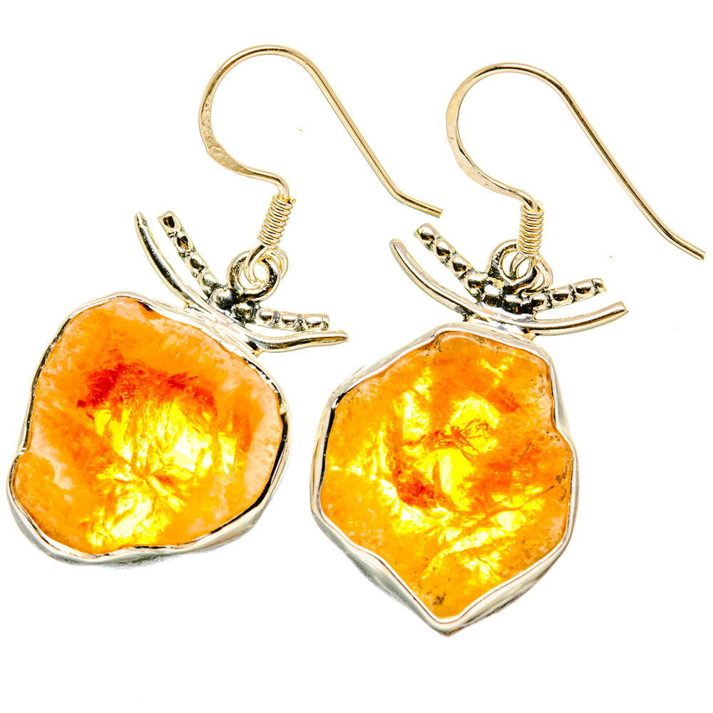 Rough citrine drop earrings with heart-shaped orange-yellow stones in silver hooks