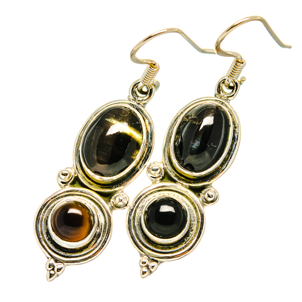Sterling silver oval drop earrings with nested bezels and four dark stones per pair