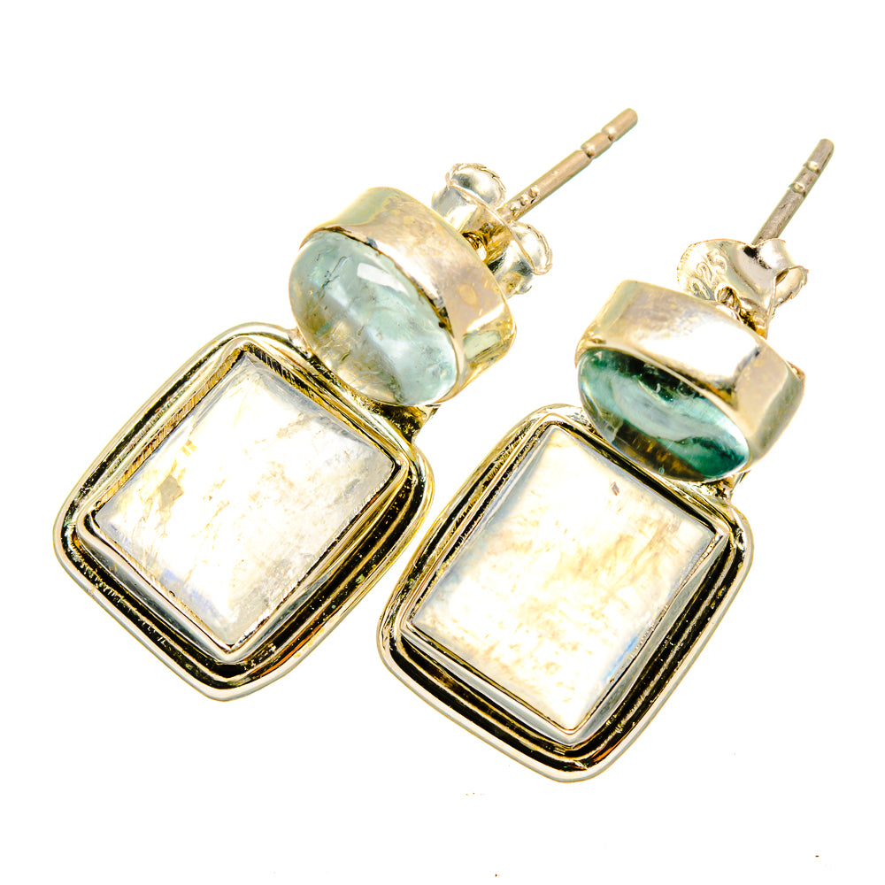 Aquamarine-colored oval stud tops with silver square drop earrings and iridescent white stone