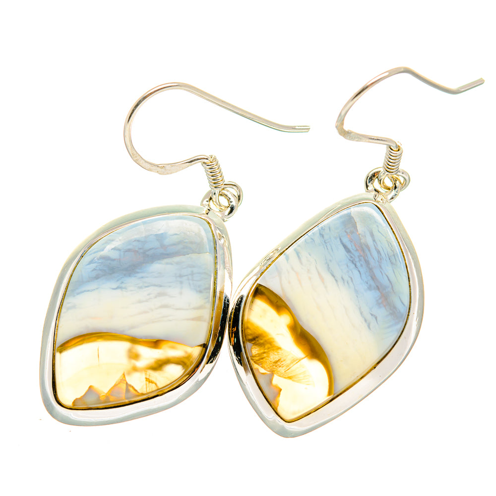 Sterling silver opal teardrop earrings with blue-white stone and reflective gold interior