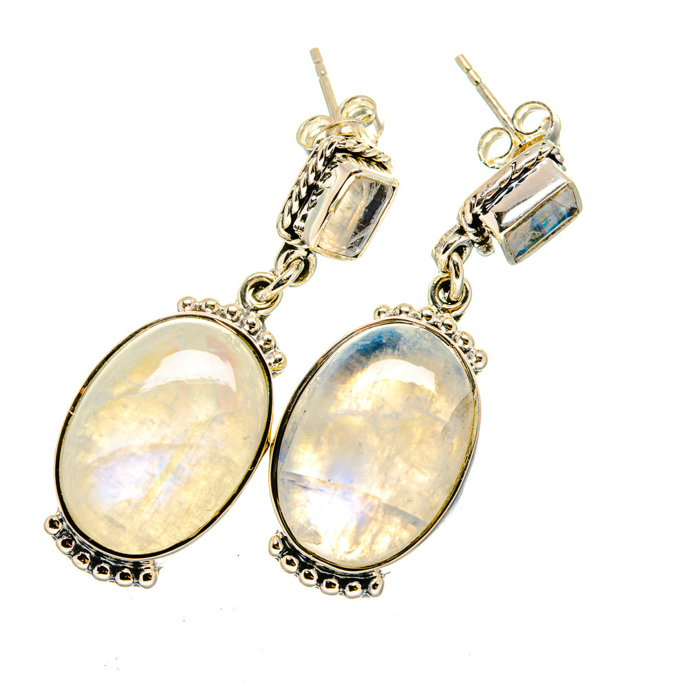 Sterling silver moonstone drop earrings with oval bezel-set opalescent stones and hook backs