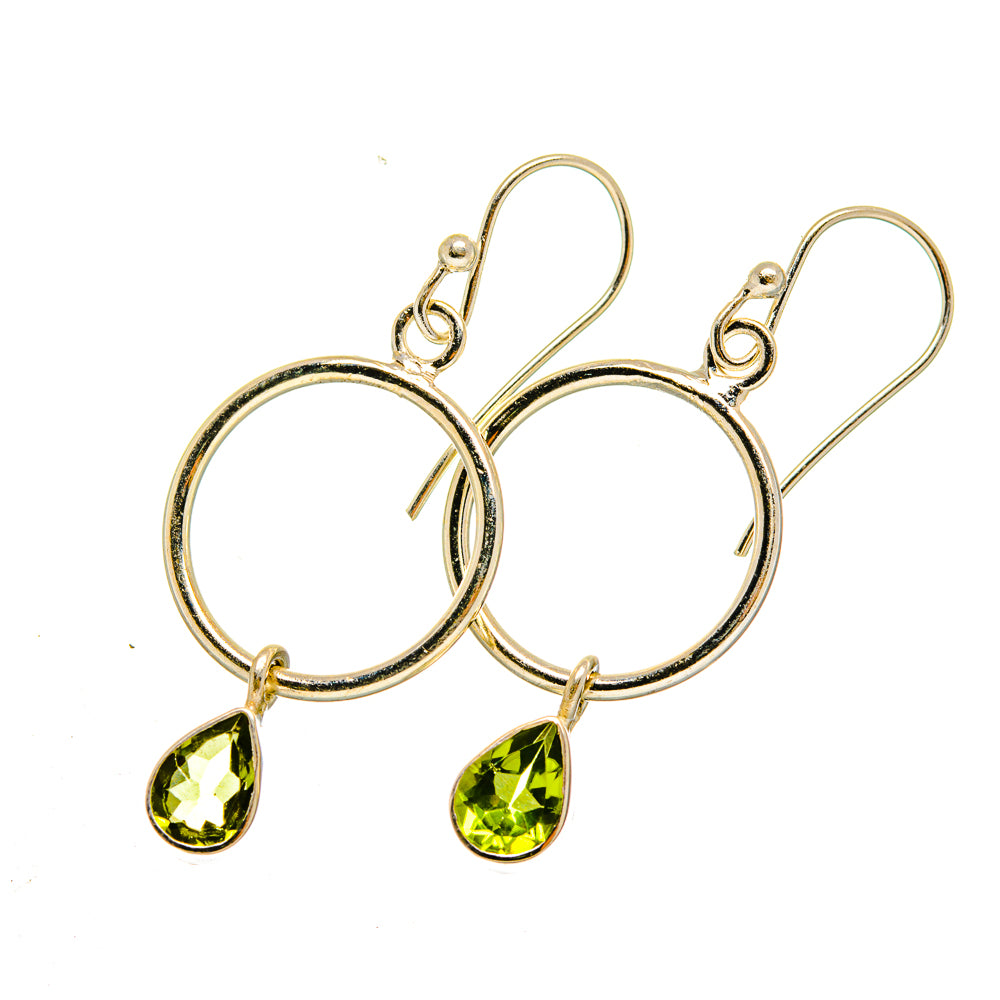 Sterling silver hoop earrings with peridot teardrop stones, lever backs