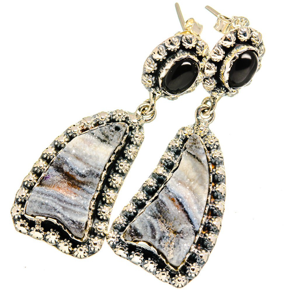 Black onyx and druzy drop earrings with ornate silver-tone bezels and dangling gray stones