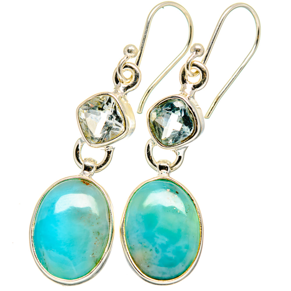 Silver-tone drop earrings with clear oval top stones and large turquoise oval charms