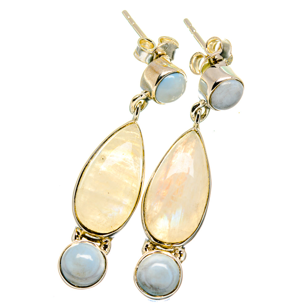 Silver-tone drop earrings with teardrop opal and moonstone accents, gold-tone hooks